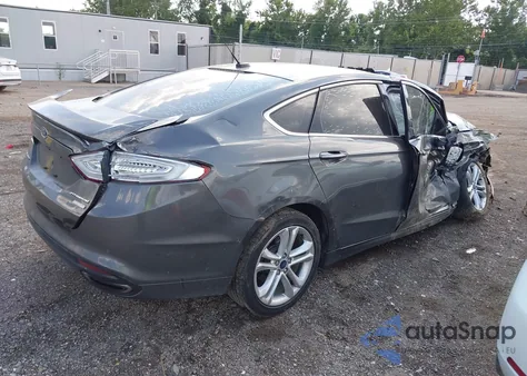 2016 Ford Fusion Titanium z USA, uszkodzony, nr VIN 3FA6P0K98GR300354